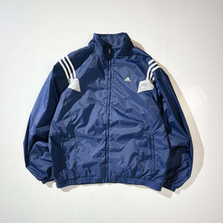 90's パフォーマンスロゴ デザイン ナイロン シェルジャケット