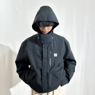 Carhartt "Storm Defender" ブラック 裏メッシュ ドローコード フーデッド ナイロン シェル ジャケット