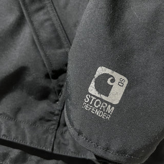 Carhartt "Storm Defender" ブラック 裏メッシュ ドローコード フーデッド ナイロン シェル ジャケット